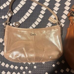 Coach Shimmering Beige Wristlet